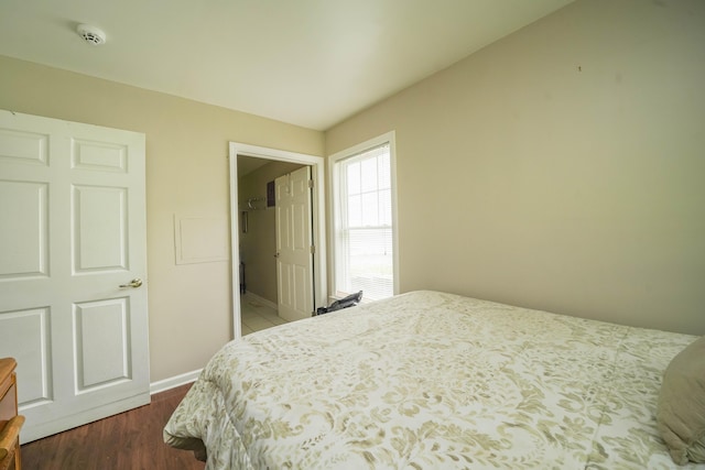 76 White St, Bridgeport, CT 06610 - bedroom featuring dark wood-type flooring and baseboards