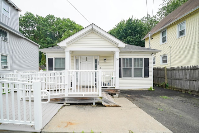76 White St, Bridgeport, CT 06610 - view of front of home featuring roof with shingles