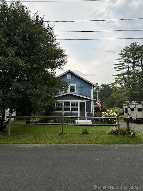58 Barlow St, North Canaan, CT 06018 - view of front of house with a front yard and driveway