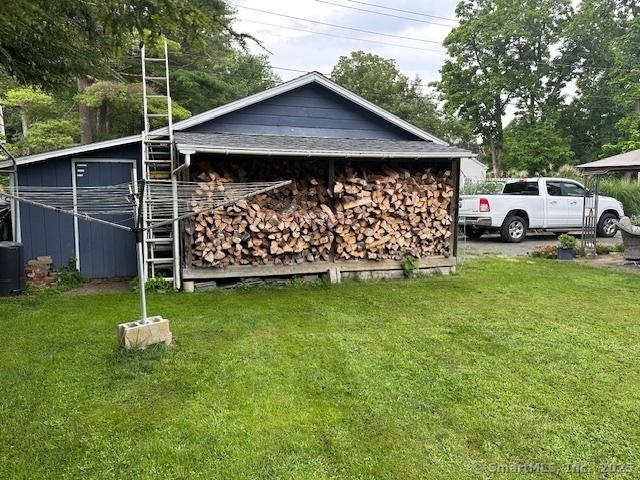 58 Barlow St, North Canaan, CT 06018 - view of side of property featuring a yard