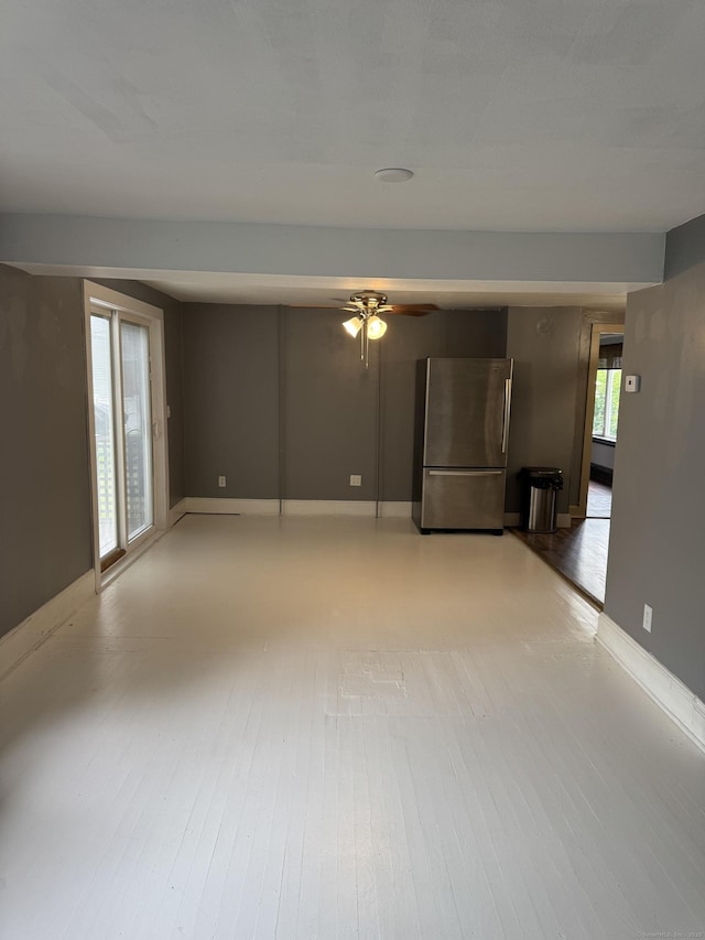 58 Barlow St, North Canaan, CT 06018 - unfurnished living room with ceiling fan and baseboards