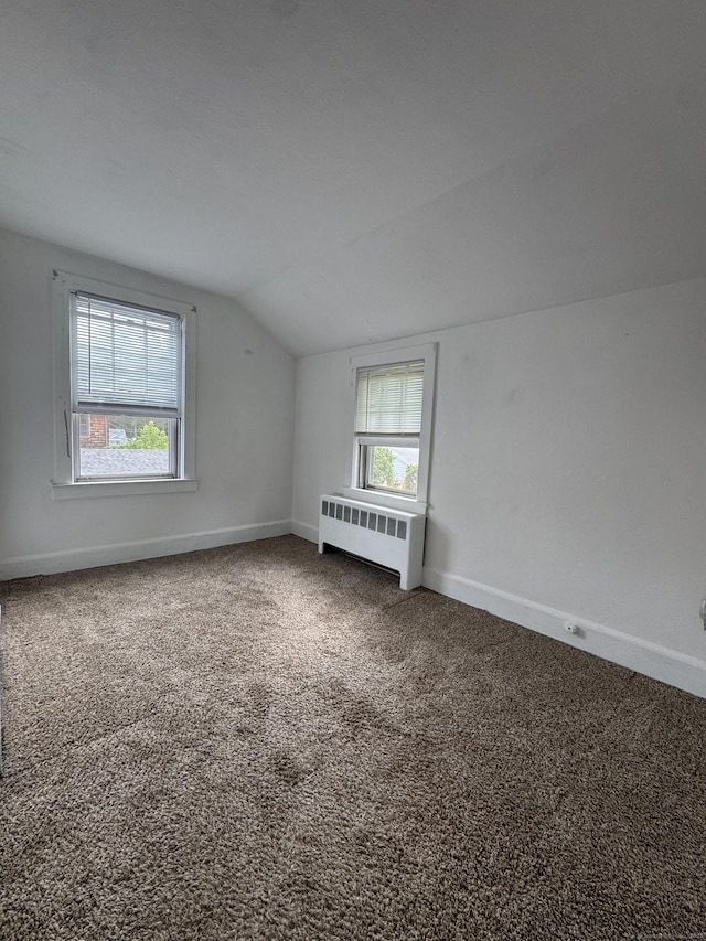 58 Barlow St, North Canaan, CT 06018 - additional living space with radiator, lofted ceiling, and carpet flooring