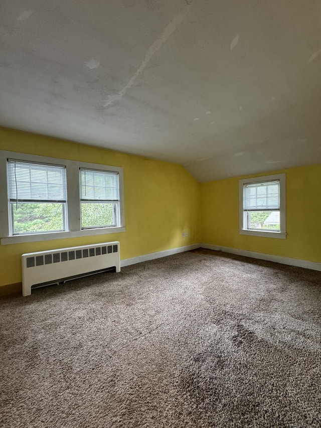 58 Barlow St, North Canaan, CT 06018 - bonus room with radiator heating unit, lofted ceiling, and carpet flooring