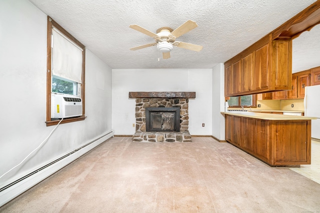 546 S Quaker Ln, West Hartford, CT 06110 - living area with baseboard heating, a ceiling fan, light colored carpet, a textured ceiling, and a fireplace