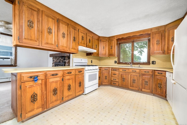 546 S Quaker Ln, West Hartford, CT 06110 - kitchen with white appliances, brown cabinetry, light countertops, and under cabinet range hood