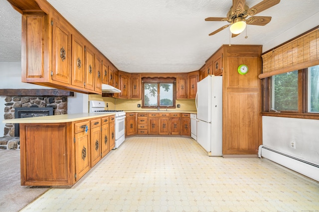 546 S Quaker Ln, West Hartford, CT 06110 - kitchen featuring white appliances, under cabinet range hood, brown cabinetry, a baseboard radiator, and a textured ceiling