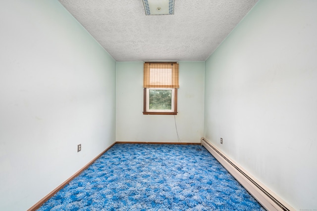 546 S Quaker Ln, West Hartford, CT 06110 - unfurnished room with a baseboard radiator, carpet floors, and a textured ceiling