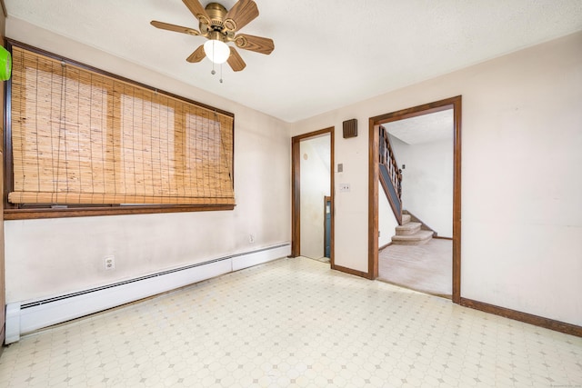 546 S Quaker Ln, West Hartford, CT 06110 - empty room featuring a baseboard heating unit, light floors, stairway, and a ceiling fan