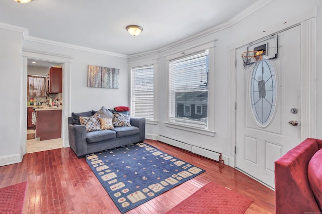 18 Morningside Ave, Waterbury, CT 06708 - entrance foyer with a baseboard radiator, crown molding, and hardwood / wood-style flooring