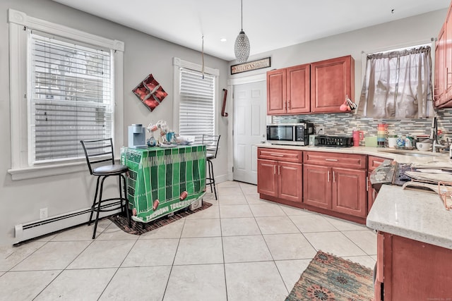 18 Morningside Ave, Waterbury, CT 06708 - kitchen featuring stainless steel microwave, backsplash, healthy amount of natural light, light tile patterned floors, and recessed lighting