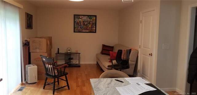 27 Amber Pl, Waterbury, CT 06705 - living area featuring wood finished floors and baseboards