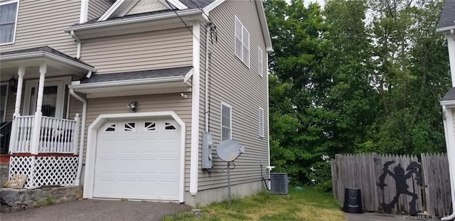 27 Amber Pl, Waterbury, CT 06705 - view of home's exterior featuring a garage and driveway