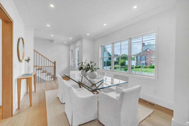 133 E Ave Unit A, New Canaan, CT 06840 - dining room with light wood finished floors, recessed lighting, and stairway