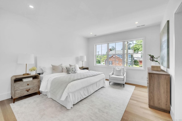 133 E Ave Unit A, New Canaan, CT 06840 - bedroom with light wood finished floors and recessed lighting