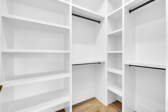 133 E Ave Unit A, New Canaan, CT 06840 - walk in closet featuring light wood finished floors