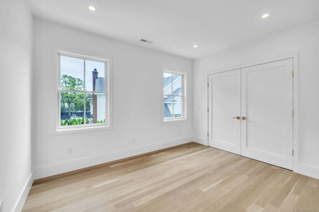 133 E Ave Unit A, New Canaan, CT 06840 - unfurnished bedroom featuring light wood-type flooring, recessed lighting, and a closet