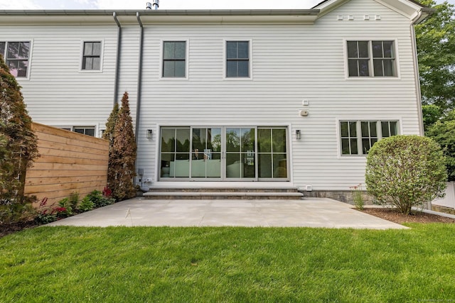 133 E Ave Unit A, New Canaan, CT 06840 - rear view of house with a patio