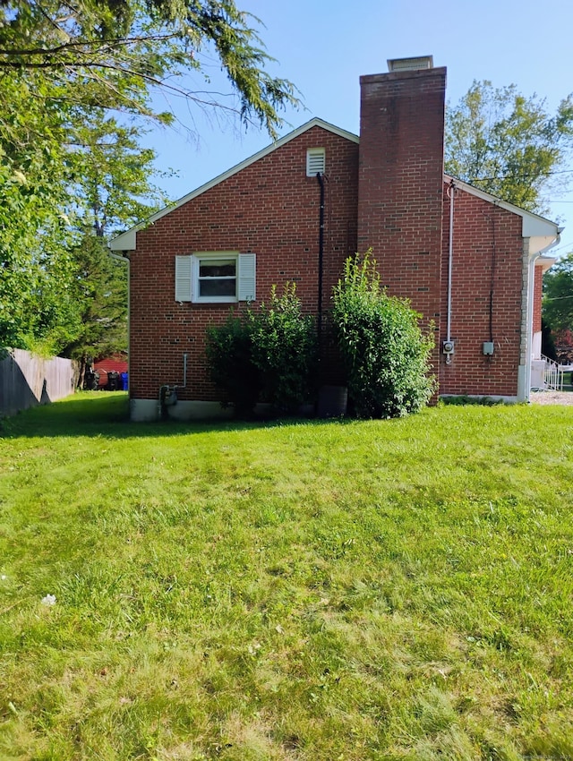 3 Rye Ridge Parkway, West Hartford, CT 06117 - view of side of property featuring a chimney and brick siding