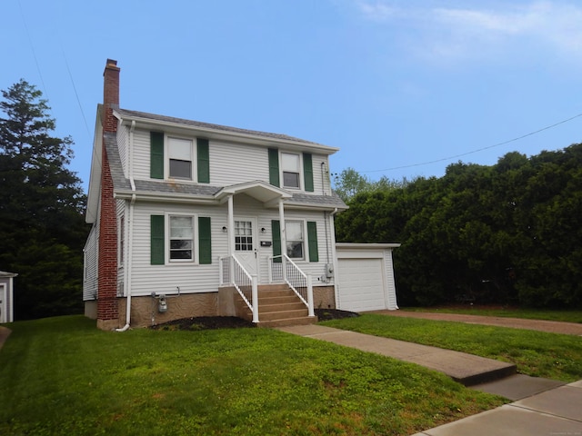 11 Morton St, New London, CT 06320 - view of front of house featuring a chimney, a front lawn, a detached garage, and driveway