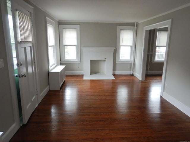 11 Morton St, New London, CT 06320 - unfurnished living room with a fireplace with flush hearth, dark wood-type flooring, and crown molding
