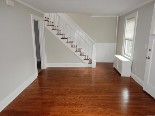 11 Morton St, New London, CT 06320 - foyer featuring crown molding, radiator heating unit, stairs, and wood finished floors