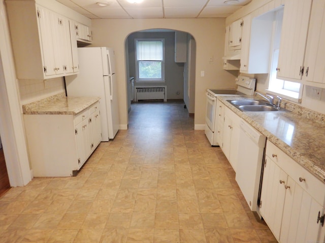 11 Morton St, New London, CT 06320 - kitchen featuring white appliances, radiator heating unit, arched walkways, a paneled ceiling, and ventilation hood