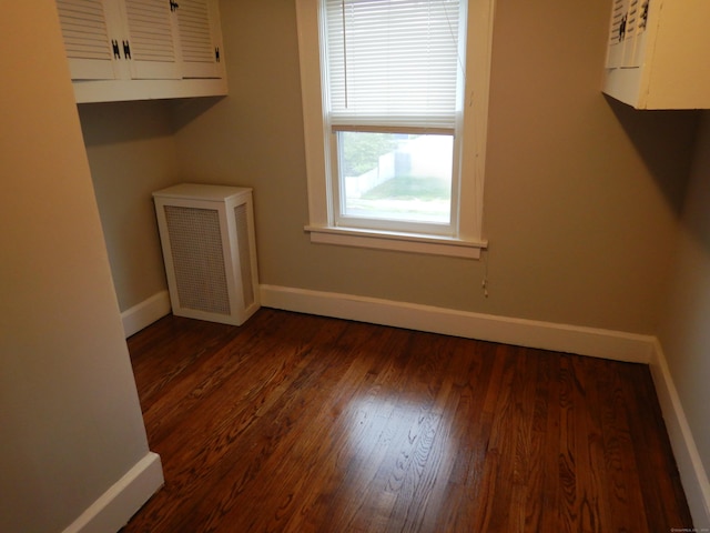 11 Morton St, New London, CT 06320 - washroom featuring baseboards and dark wood-style floors