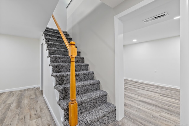 301 Pondview Dr, Southington, CT 06489 - stairway featuring wood finished floors and recessed lighting