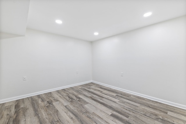 301 Pondview Dr, Southington, CT 06489 - spare room with wood finished floors and recessed lighting