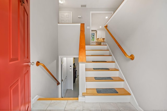142 Raffia Rd, Enfield, CT 06082 - staircase with recessed lighting and tile patterned flooring