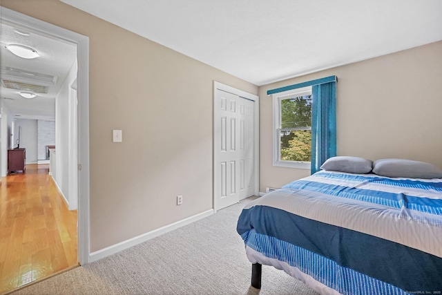 142 Raffia Rd, Enfield, CT 06082 - bedroom with baseboards and a closet