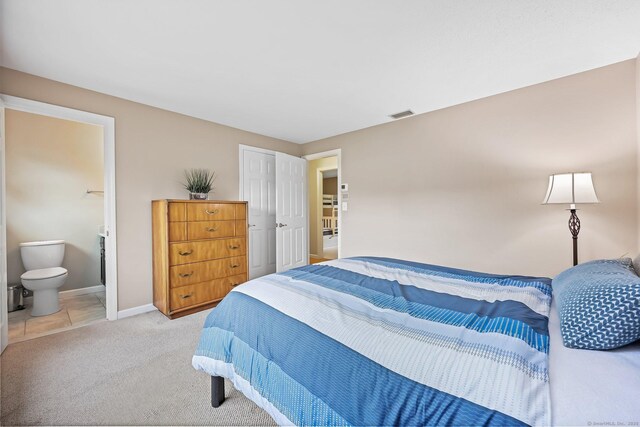 142 Raffia Rd, Enfield, CT 06082 - bedroom with light carpet and ensuite bathroom