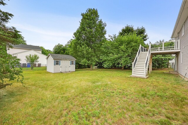 142 Raffia Rd, Enfield, CT 06082 - view of yard with stairway and a storage shed
