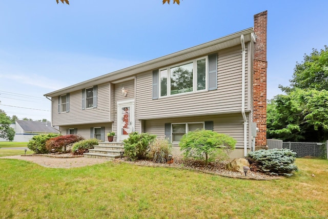142 Raffia Rd, Enfield, CT 06082 - bi-level home with a chimney