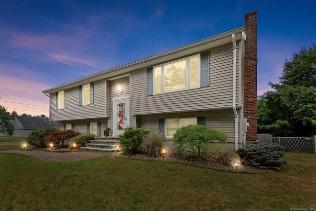 142 Raffia Rd, Enfield, CT 06082 - split foyer home with a chimney
