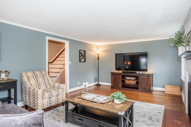 11 Craigmoor Rd, West Hartford, CT 06107 - living area featuring stairway, crown molding, and wood finished floors