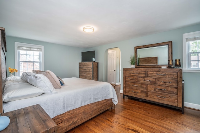 11 Craigmoor Rd, West Hartford, CT 06107 - bedroom featuring arched walkways and wood finished floors