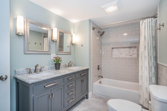 11 Craigmoor Rd, West Hartford, CT 06107 - bathroom featuring shower / tub combo and double vanity
