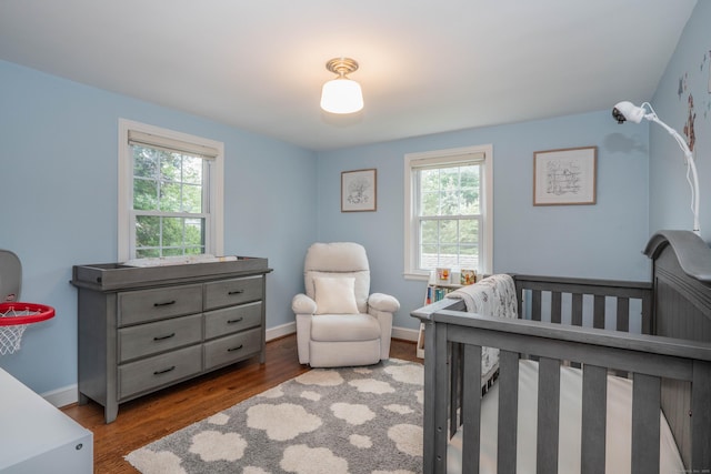 11 Craigmoor Rd, West Hartford, CT 06107 - bedroom with a crib and wood finished floors