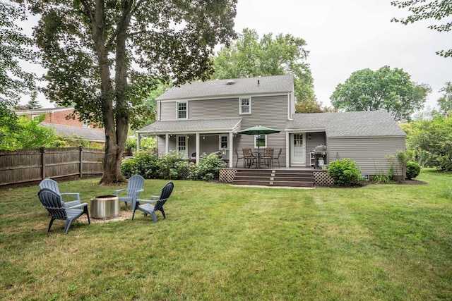11 Craigmoor Rd, West Hartford, CT 06107 - rear view of property with a deck, an outdoor fire pit, roof with shingles, and outdoor dining space