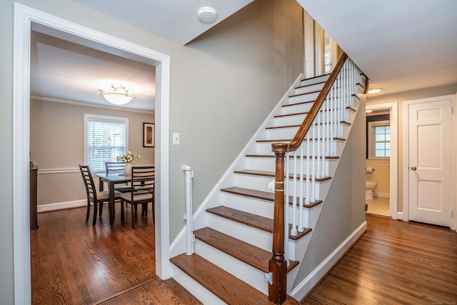 11 Craigmoor Rd, West Hartford, CT 06107 - stairs featuring wood finished floors and crown molding