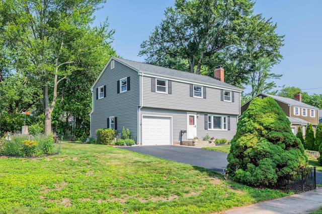 112 Shadow Ln, West Hartford, CT 06110 - colonial inspired home with driveway, a chimney, an attached garage, and a front yard