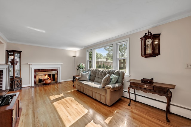 112 Shadow Ln, West Hartford, CT 06110 - living area featuring a fireplace, baseboard heating, wood finished floors, and ornamental molding