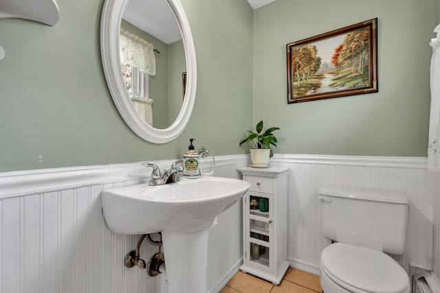 112 Shadow Ln, West Hartford, CT 06110 - half bathroom with a wainscoted wall and tile patterned flooring
