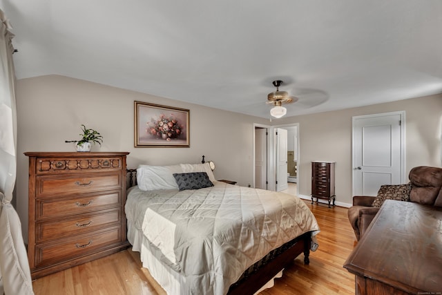 112 Shadow Ln, West Hartford, CT 06110 - bedroom with light wood-type flooring, a baseboard heating unit, vaulted ceiling, and a ceiling fan