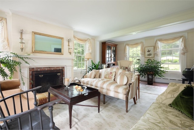 12 Popple Swamp Rd, Cornwall, CT 06754 - living room featuring ornamental molding, a baseboard heating unit, light wood finished floors, and a brick fireplace