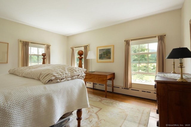 12 Popple Swamp Rd, Cornwall, CT 06754 - bedroom featuring baseboard heating and light wood-style flooring