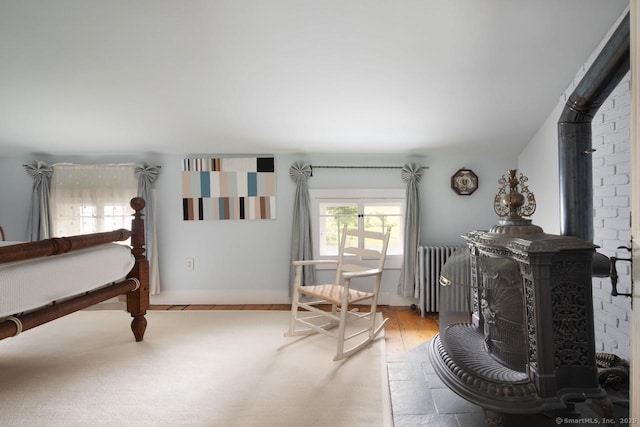 12 Popple Swamp Rd, Cornwall, CT 06754 - dining area with radiator heating unit and a wood stove