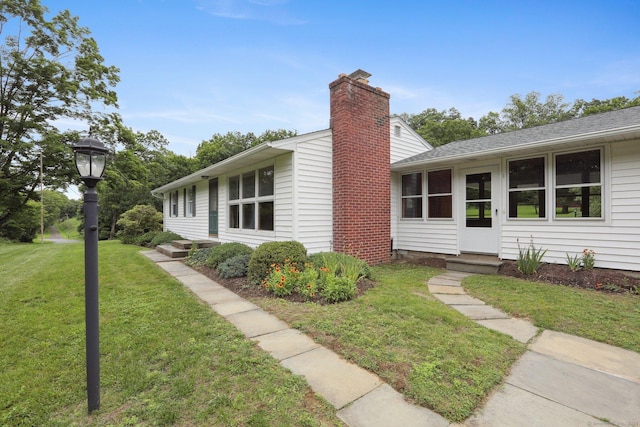 1 Old Middle Rd, New Milford, CT 06776 - view of property exterior featuring entry steps, a yard, and a chimney