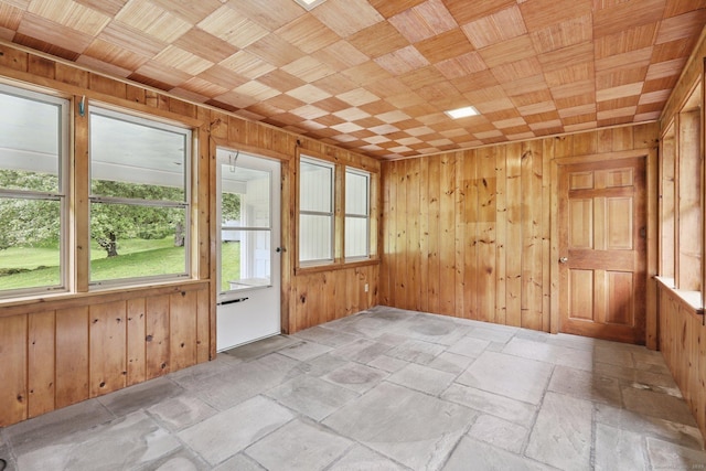 1 Old Middle Rd, New Milford, CT 06776 - spare room featuring wood walls and stone tile floors
